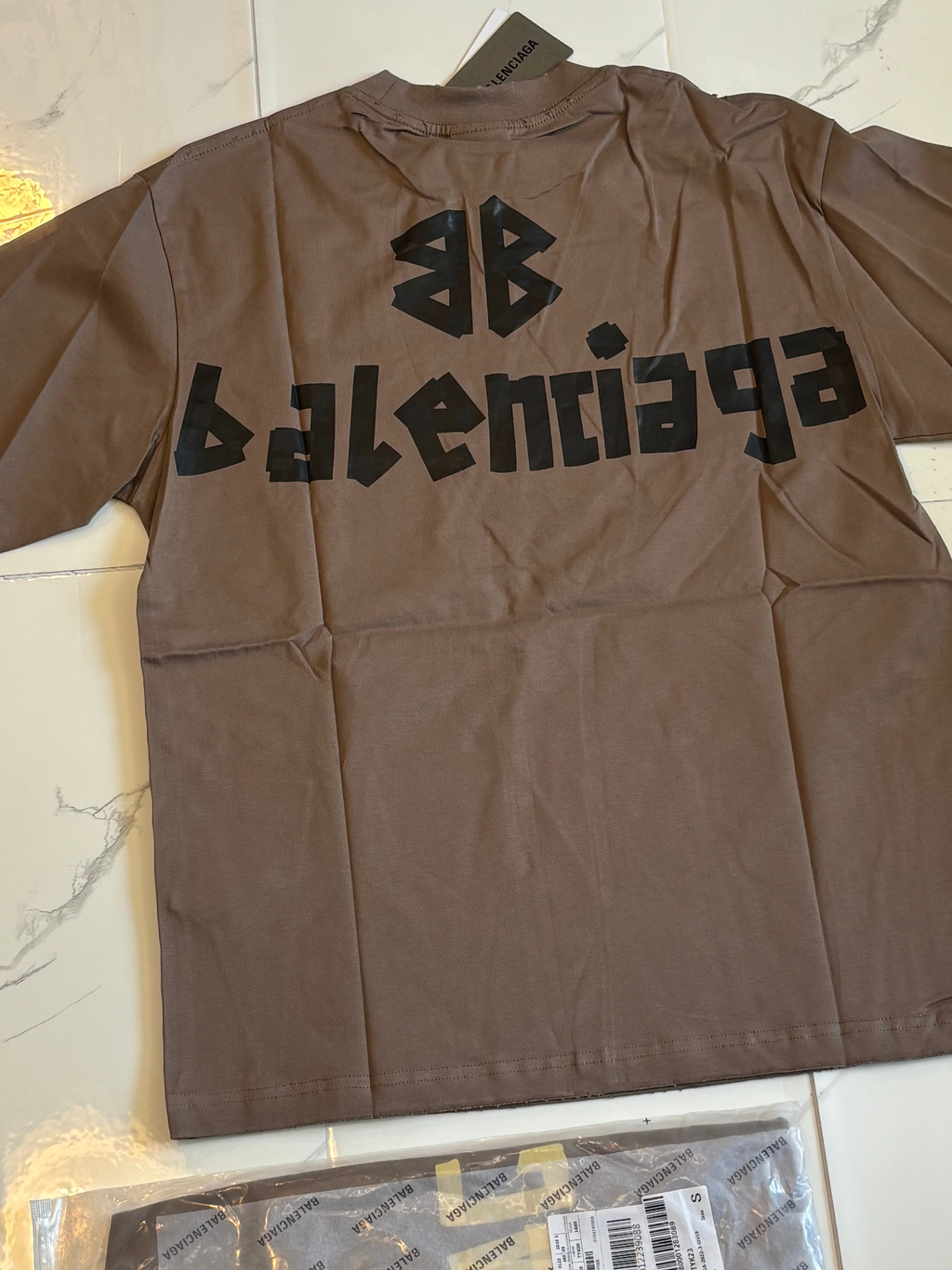 BALNCIAGA YELLOW TAPE tan t shirt