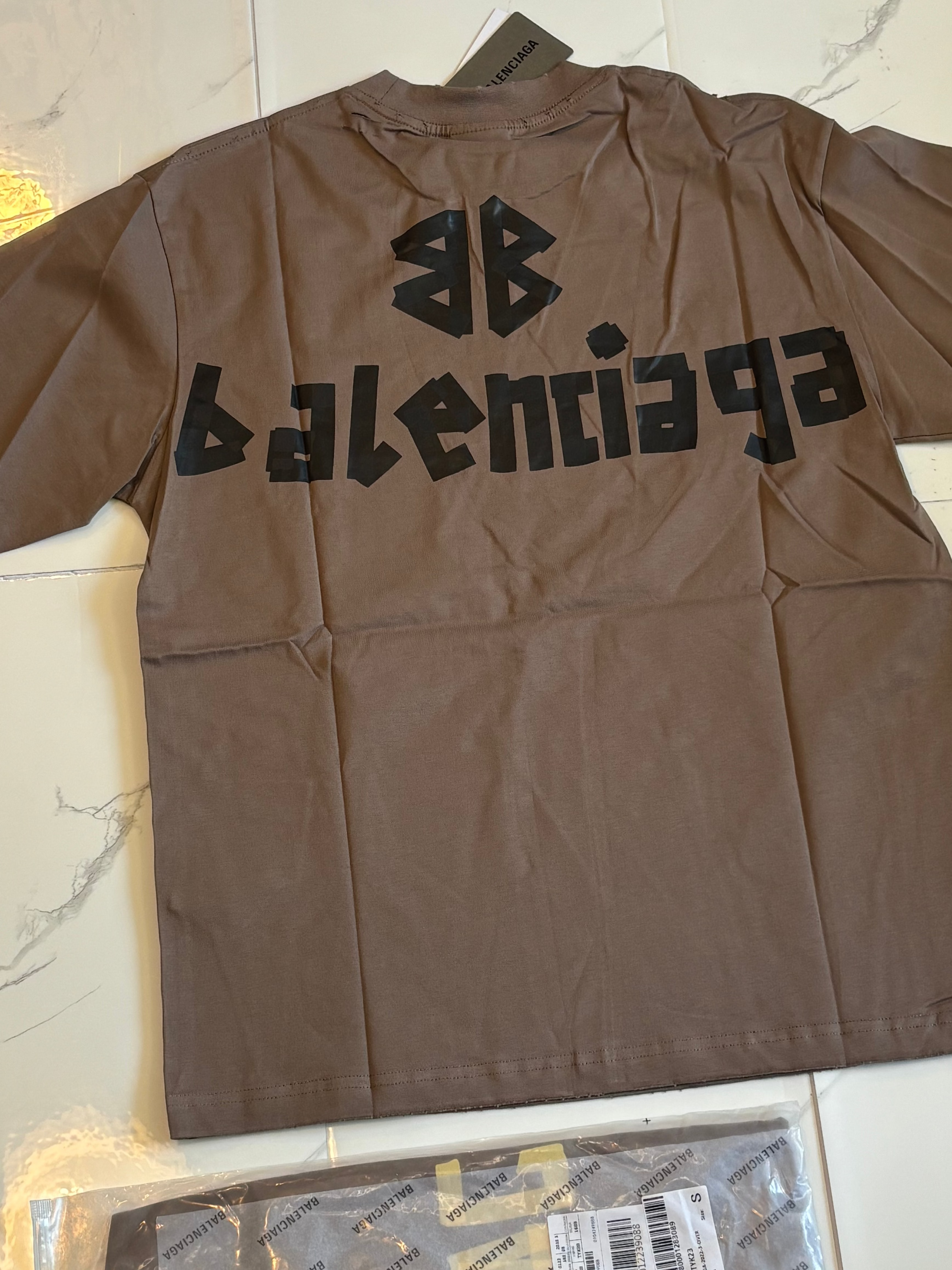 BALNCIAGA YELLOW TAPE tan t shirt