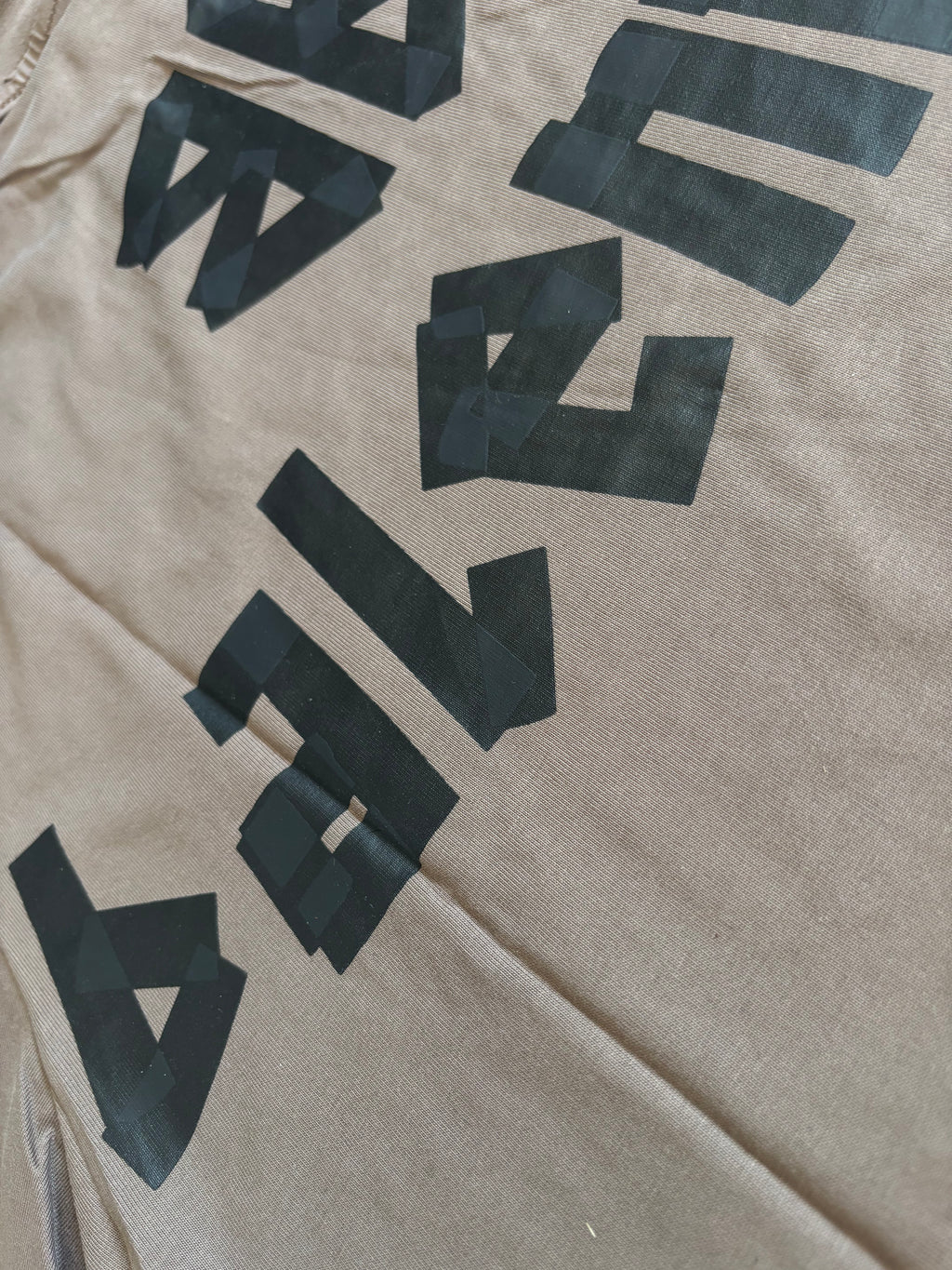 BALNCIAGA YELLOW TAPE tan t shirt