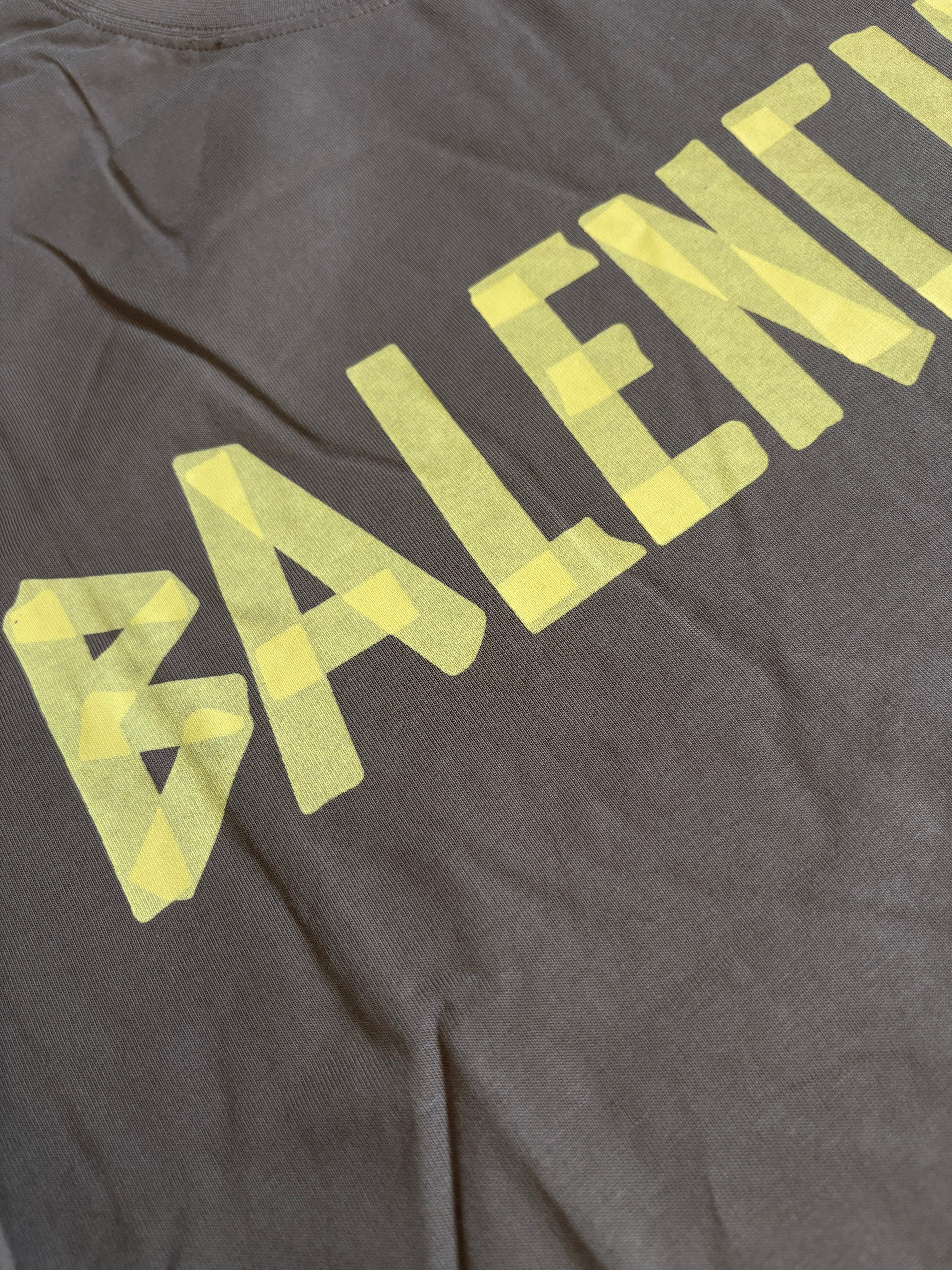BALNCIAGA YELLOW TAPE tan t shirt